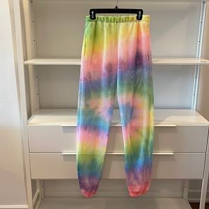 Dolls Kill , tie dye mesh/fishnet pants with pockets. Size large.